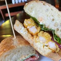 Shrimp Po'boy · fried shrimp, shredded lettuce, tomato, pickles, tartar sauce, ciabatta