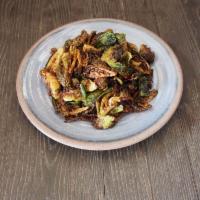 Brussels Sprouts · Crisped Brussels sprouts tossed in our savory caramel glaze. Gluten-free. Vegetarian.