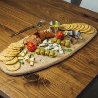 Charcuterie Board Lunch · Andouille and wild boar sausage served with market cheeses, gourmet crackers, queen olives a...