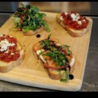 Bruschetta Boards Dinner · Fresh mozzarella, tomato and basil warm kale spinach sweet n' spicy jam and goat cheese mozz...