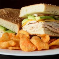 Pressed Home-Made Baked Chicken Sandwich · Comes with avocado, cheddar, and chipotle sauce.