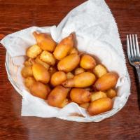 Mini Corn Dog Basket · Served with tater tots.