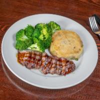 Filet Tips · 6 oz steak filet tips in teriyaki glaze. Served with potato cake and steamed broccoli.