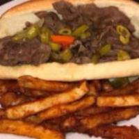 Italian Beef Sandwich · Thin sliced top sirloin cooked in our own Italian au jus served on a hoagie roll with giardi...