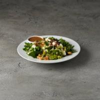Chopped Salad · Romaine lettuce, tomatoes, mozzarella chickpeas, corn, onions, avocado, olives, crispy prosc...