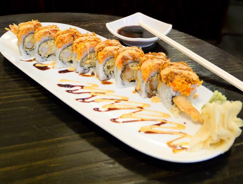 Arcade Roll · Fried shrimp, crunch, topped with spicy crab, eel sauce and spicy mayo.