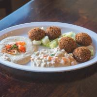 Falafel Plate · 5 home made falafel served with pita, hummus and our signature tehini salad.