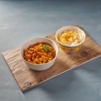 Chana Masala · Chickpeas slowly simmered with potatoes, onions, tomatoes and spices.
