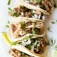 Carnitas Tacos Family Pac · Make your own Street TACOS: 16 oz Fresh Carnitas, cilantro, onions, 20 oz Beans, 20 oz Rice,...