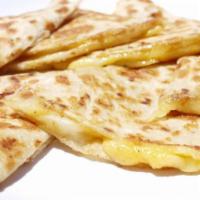 Quesadilla Cheese · A large flour tortilla filled with mouth watering melted Jack and Cheddar Cheese folded into...
