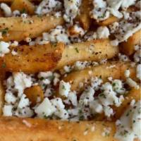 Palm Fata Frys · Our french fries with feta cheese and seasonings.