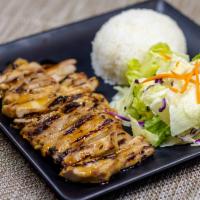 Boneless Chicken · Served with rice and salad.