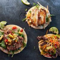 THREE Tacos · Plate of Three Tacos: Corn Tortilla Topped With Your Choice Of Filling, Chipotle Mayo, Arugu...