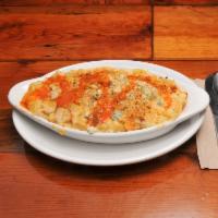 Buffalo Chicken · Fried chicken tossed in house made buffalo sauce, celery, garlic, pepper jack cheese. Topped...