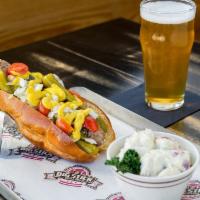 Chi-Town Big Stick · Polish sausage, relish, tomato, onion, mustard, pickles and sport peppers.