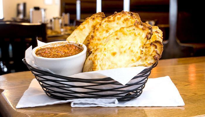Garlic Cheese Bread Basket · Side of sauce: meat, Alfredo, or pizza sauce for an additional charge.
