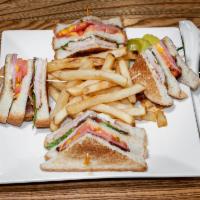 Adagio's Club Sandwich · Turkey, ham, bacon, lettuce, mayo, tomato, Swiss and American cheeses, Texas toast.