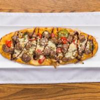 Bleu Cheese Steakhouse Flatbread · Remoulade, steak, sauteed onions, red and green peppers, blue cheese crumbles, and balsamic ...