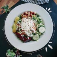 Cannellas Italian Salad! · with cucumbers, beets, pepperoncini, garbanzo & kidney beans, mozzarella, local sausage, & C...