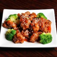 Sesame Chicken Combination Plate · Served with choice of fried rice or white rice and shrimp or pork egg roll.