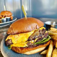 Helmsman Burger · Chuck brisket patty, Bibb lettuce, grilled onion, house sauce, tomato, brioche and American ...