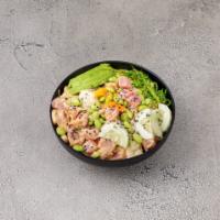 Spicy Tuna Rice Bowl · Tuna, avocado, edamame, cucumber, seaweed, masago with sushi rice or brown rice and poke sau...