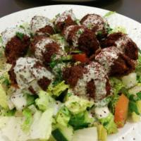 Falafel Salad · Salad with fried balls made from beans. 