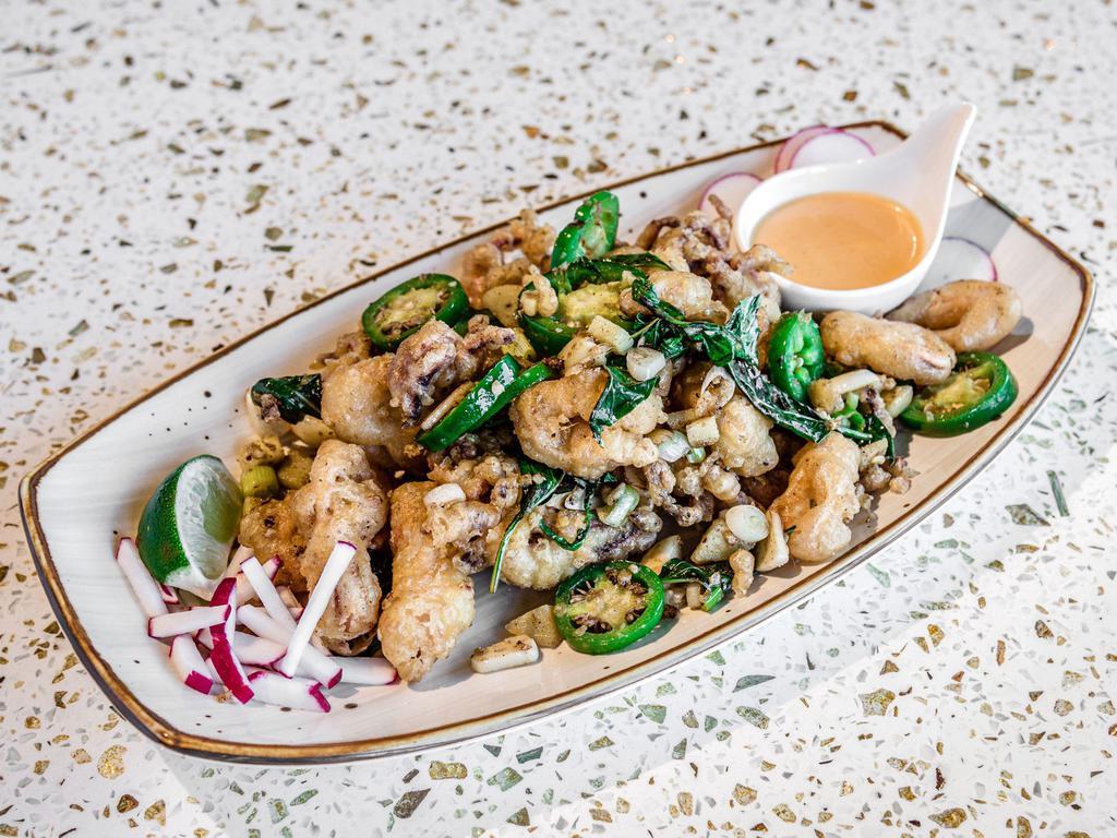 Salt and Pepper Calamari · Tossed with garlic, onion, jalapeno, salt, and pepper. Spicy.