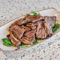 Grilled Short Ribs · Grilled beef short ribs (bone-in) tossed with sweet honey garlic soy, served with grilled on...