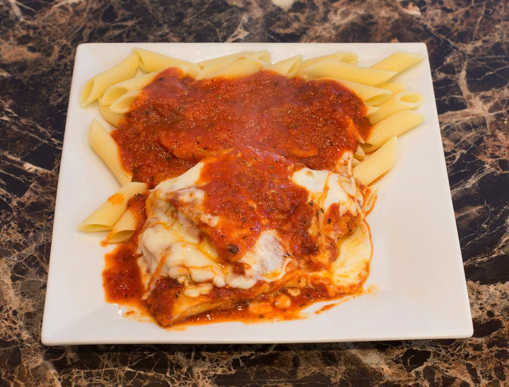 Chicken Parmigiana · Homemade marinara sauce over tender chicken cutlet smothered in mozzarella and grated Parmesan cheese.