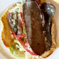 Gyro Plate · Premium quality gyro meat served on grilled pita bread with tomatoes, onions, lettuce and ou...