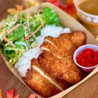 Chicken Katsu Curry Plate · Chicken Breast Katsu Cutlet over White Rice, served with pickled radishes & Japanese curry s...