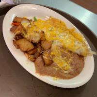 Denver Omelet · 3 eggs scrambled with grilled onions, bell peppers and ham.