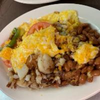 Veggie Omelet · 3 eggs scrambled with grilled onions and bell peppers.