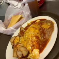 Chorizo · Three eggs filled with chorizo onions and cheese. Served with refried beans potatoes and cho...