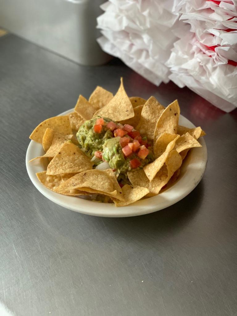 Guacamole Salad · Served with tostada chips. Gluten free.
