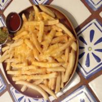 Chile Cheese Fries · Fries topped with melted cheese and smothered with red or green chile. Vegetarian. Gluten fr...