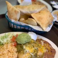 Chimichanga · Thin flour tortilla filled with choice of shredded chicken, roast beef or carne adovada deep...