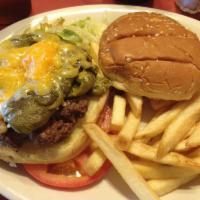 Bill's Green Chile Cheeseburger · Homemade ground beef patty topped with cheddar and fresh new Mexican green chile on a toaste...