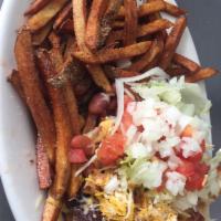 Sopapilla Burger · Sopapilla stuffed with ground beef patty and smothered with whole beans, choice of chile chi...
