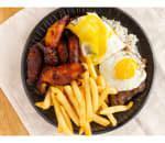 Bistec a Lo Pobre · Tender steak, plantains served over french fries, rice, and fried eggs.