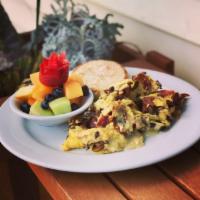 Bacon and Brie Scramble · 2 cage free eggs, bacon, brie, mushrooms, and chives.