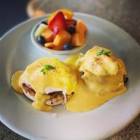 Michael's Classic Benedict · Two medium poached eggs, English muffin, Canadian bacon, hollandaise