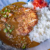 Chicken Katsu Curry* · Chicken katsu over rice, topped with our house curry simmered with our assorted vegetables.