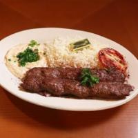 Lamb And Kofta Kabob Combo · One skewer of lamb and one skewer of kafta (ground beef, parsley, and onion) grilled over an...
