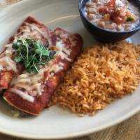 Short Rib Enchiladas · Braised short rib, toasted gaujillo salsa de enchiladas, melted queso chihahua. Served with ...