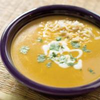 Mulligatawny Soup · Lentil, carrot, celery and curry flavored. Vegetarian.