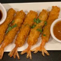 Crispy Shrimp Tempura · Five pieces, Shrimp tempura with sauce,  as an appetizer. Prepared with flour, cornstarch, e...