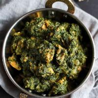 Chicken au Spinach  · “A healthy diet” Chicken, tomato, and spinach curry is gently spiced with the Indian flavors...