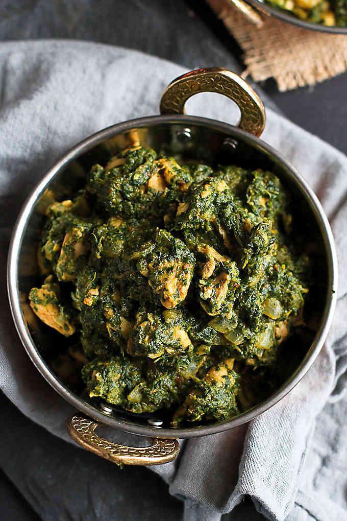 Chicken au Spinach  · “A healthy diet” Chicken, tomato, and spinach curry is gently spiced with the Indian flavors of cumin, coriander, and turmeric.